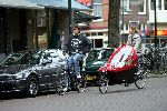 Amsterdam 18 september 2004
Danielle Overaag en Reinout Oerlemans  en Tijmen op de fiets