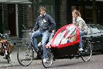 Amsterdam 18 september 2004
Danielle Overaag en Reinout Oerlemans  en Tijmen op de fiets