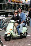 Amsterdam 11 september 2004
Gallyon v Vessem met vriend en hond op scooter. 
Gallyon steekt tong uit