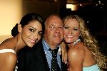 Monaco 10 september 2004
Modeshow Monique Collignon in Monaco. 
Inge de Bruijn met Joop Braakhekke en Touriya