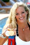 Monaco 10 september 2004
Inge de Bruijn in Monaco met olympische medailles.