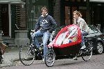 Amsterdam 18 september 2004
Danielle Overaag en Reinout Oerlemans  en Tijmen op de fiets