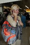Schiphol 19 september 2005
Caroline Tensen vertrekt naar kilimajaro met Titus Kramer. 
gsm