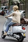 Amsterdam 24 september 2005
Connie Breukhoven op vespa scooter op cornelis schuytstraat
