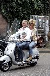 Amsterdam 24 september 2005
Hans Breukhoven en Connie Breukhoven op vespa scooter op cornelis schuytstraat