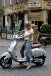 Amsterdam 24 september 2005
Connie Breukhoven op vespa scooter op cornelis schuytstraat