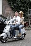 Amsterdam 24 september 2005
Hans Breukhoven en Connie Breukhoven op vespa scooter op cornelis schuytstraat