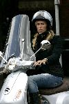 Amsterdam 17 september 2005
Estelle Gullit op vespa scooter op cornelis schuytstraat