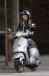 Amsterdam 17 september 2005
Estelle Gullit op vespa scooter op cornelis schuytstraat