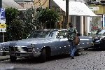 Amsterdam 6 september 2005
Isa Hoes met grote cadillac op cornelis schuytstraat
