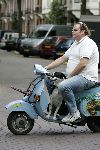 Amsterdam 24 september 2005
Menno Kohler op oude vespa scooter met hond erop