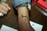 Amsterdam 1 september 2005
Rachel Hazes bij medium Char in hotel the Grand. tatoo Andre Rachel