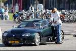 Amsterdam 25 september 2003
Winston Gerschtanowitz in SpykerCabrio van 250 000 euro
bellend met zijn gsm