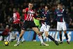Eindhoven, 17 December 2005
Kompetiewedstrijd seizoen 2005/2006 
PSV-Willem II eindstand 4-1
Timmy simons in duel met zijn tegenstander
© Foto Bart Bel