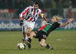 Tilburg, 28 januari 2006
Kompetitiewedstrijd seizoen 2005-2006
Willem ll - NEC eindstand 2-2
Bjorn van der Doelen maakt sleiding tegen Raymond Victoria