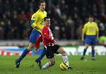 Eindhoven, 20 Januari 2006 
Kompetitiewedstrijd Seizoen 2005/2006 
PSV-RKC Waalwijk eindstand 2-0 
Jason Culina geeft een pass vanaf  het middenveld
© Edwin van Zandvoort