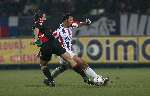 Tilburg, 28 januari 2006
Kompetitiewedstrijd seizoen 2005-2006
Willem ll - NEC eindstand 2-2
Peter Wisgerhof dueleerd met Moussa Dembele