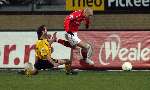 Kerkrade, 27 Januari 2006 
Kompetitiewedstrijd seizoen 2005/2006
RODA JC - AZ eindstand 1-4
Stein Huysegems wordt getackeld door Ger Senden
©Edwin van Zandvoort