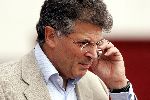 Amsterdam 31 juli 2004 
David Dein with mobile phone at the training of Arsenal