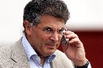 Amsterdam 31 juli 2004 
David Dein withe mobile phone at the training of Arsenal
