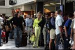 Cannes 19 juli 2004
Ivana Trump met haar jonge vriend Rossano Rubicon op het vliegveld van Cannes