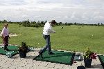 Halfweg 26 juli 2005
Sebastiaan Labrie laat golf clubsaanmeten van Taylor made.
Peter Smulders bv