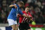Eindhoven, 5 November 2005 
Kompetitiewedstrijd Seizoen 2005/2006 
PSV-Sparta eindstand 3-0
Timmy Simons wordt stevig aan zijn shirt getrokken
© Foto Bart Bel