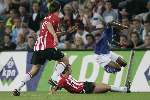 Eindhoven, 10 September 2005 
Competitie wedstrijd PSV-FC Utrecht 
Eindstand 1-0
Phillip Cocu maakt een stevige tackle op Edson Braafheid
© Foto Bart Bel